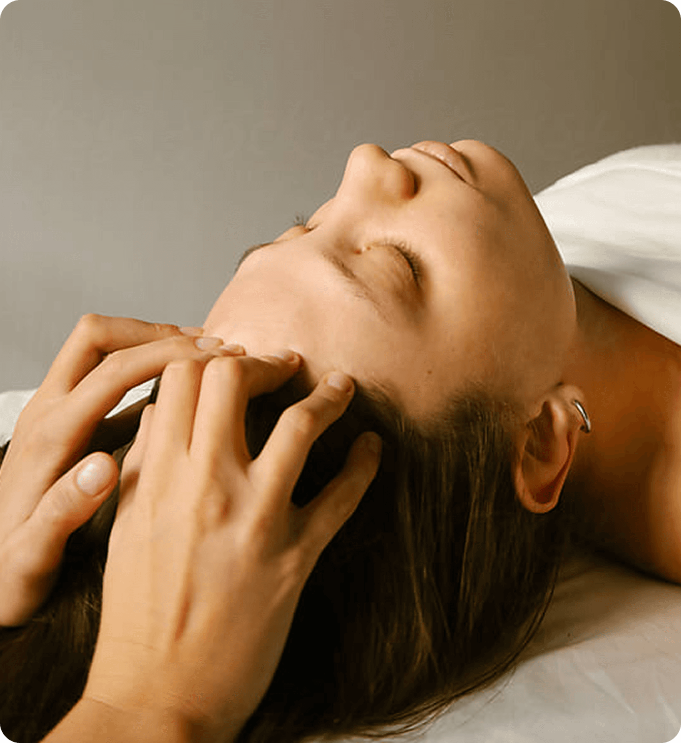 Woman receiving a massage in her head